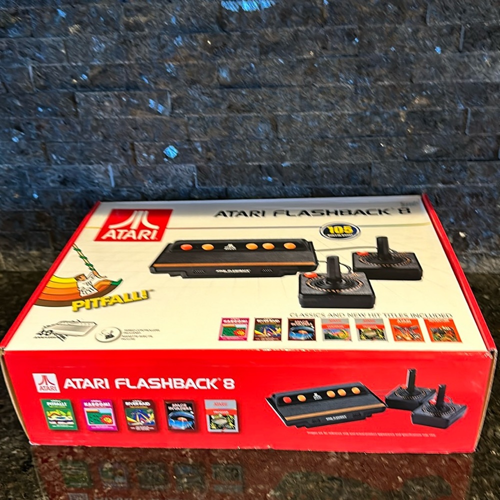 Atari Flashback 8, 105 built in games. Box has been opened but nothing removed.